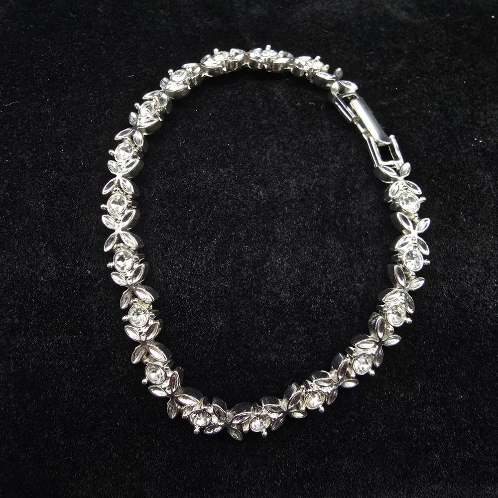 Avon Rhinestone Floral Tennis Bracelet Silver Tone Vintage Costume Jewelry